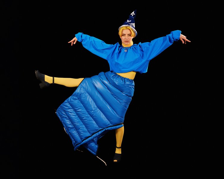 Dancing clown wizard in blue